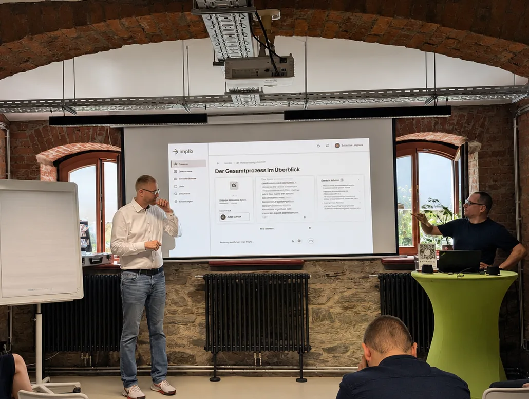 Live-Demo des Implix Interviewassistenten vor dem Publikum.